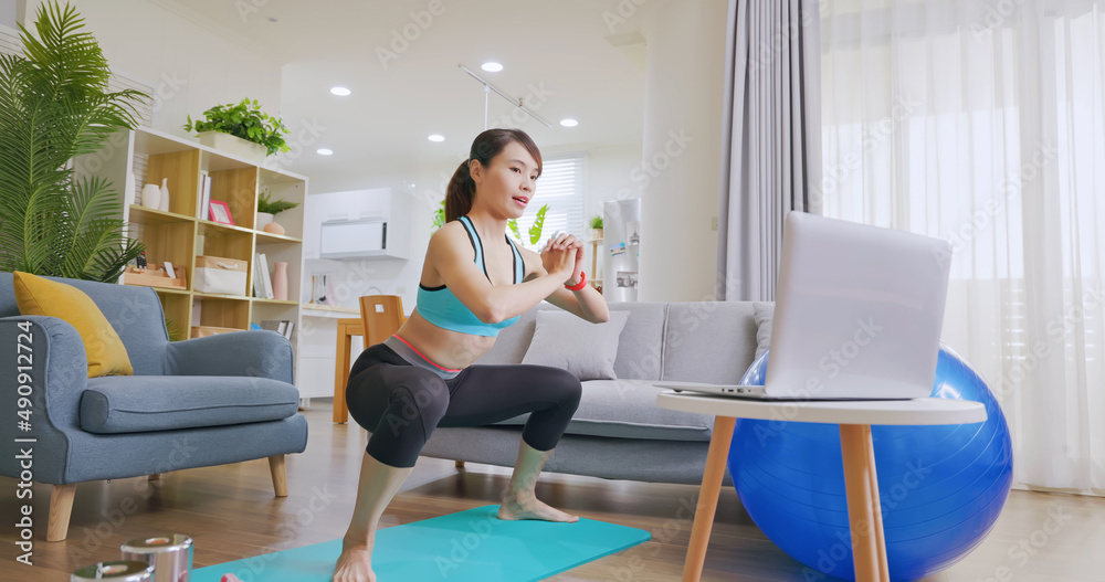 woman doing exercise at home