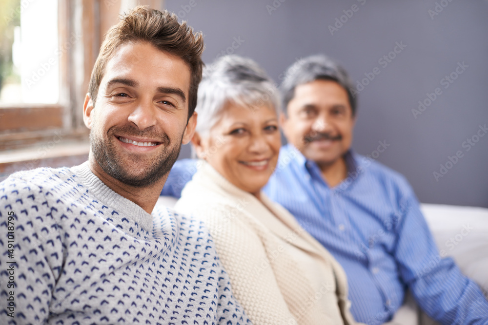 My parents have the best marriage. Cropped portrait of a senior couple sitting with their adult son 