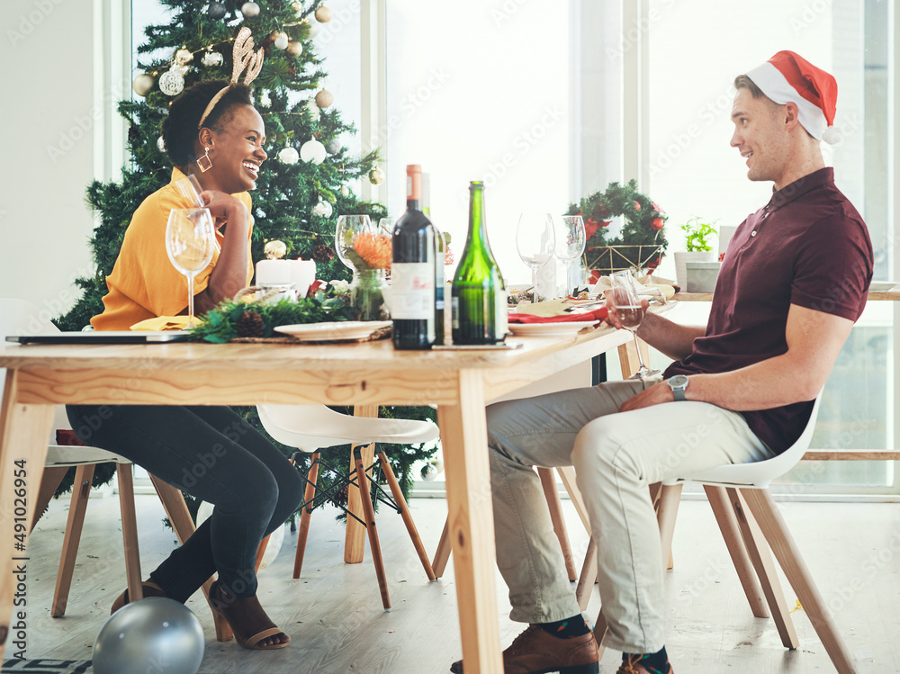 By the way you did such a great job decorating. Full length shot of a cheerful young couple having a