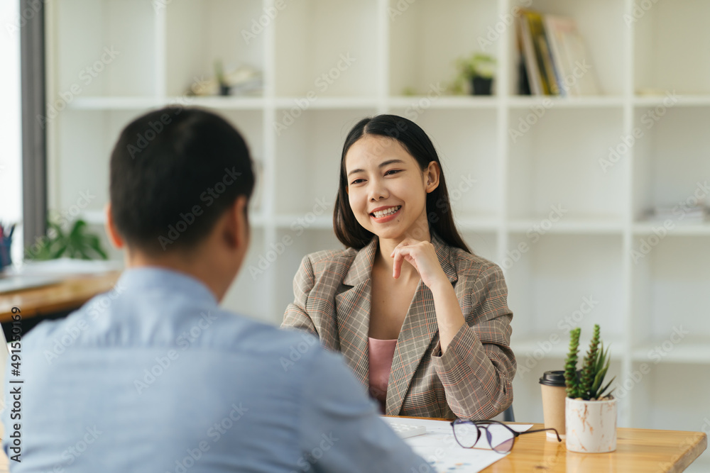 Skilled female leader of marketing experts working group explaining successful strategy for startup 