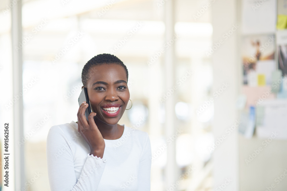 Proper communication ensures all the deals. Portrait of a young businesswoman talking on a cellphone