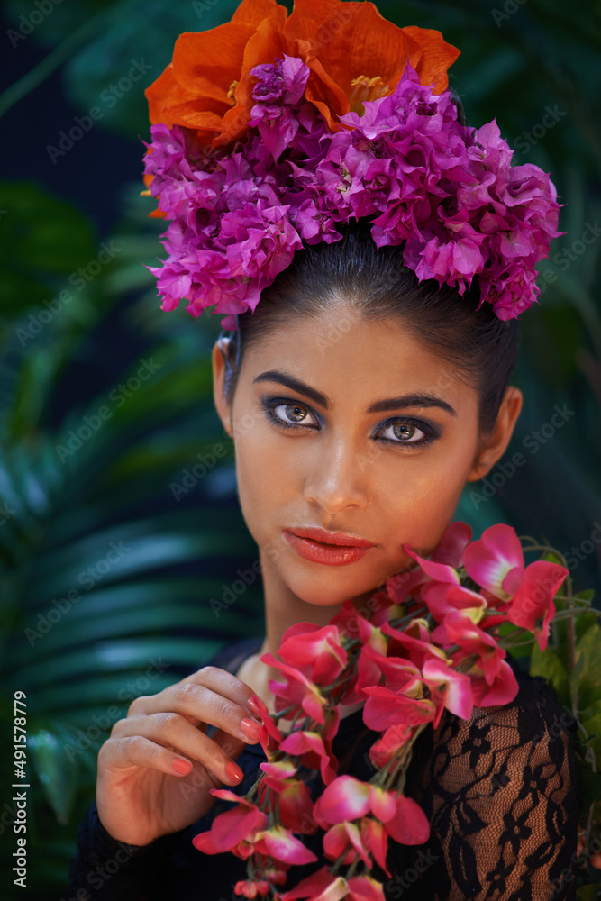 Beautiful culture. A portrait of a beautiful woman wearing colorful flowers.