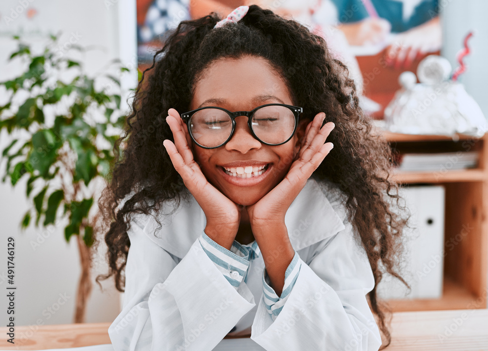 Why didnt anyone tell me science is so much fun. Portrait of an adorable young school girl feeling c