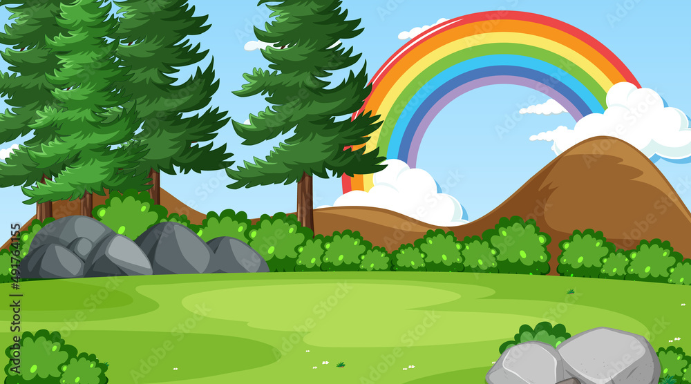 Nature forest scene with rainbow in the sky