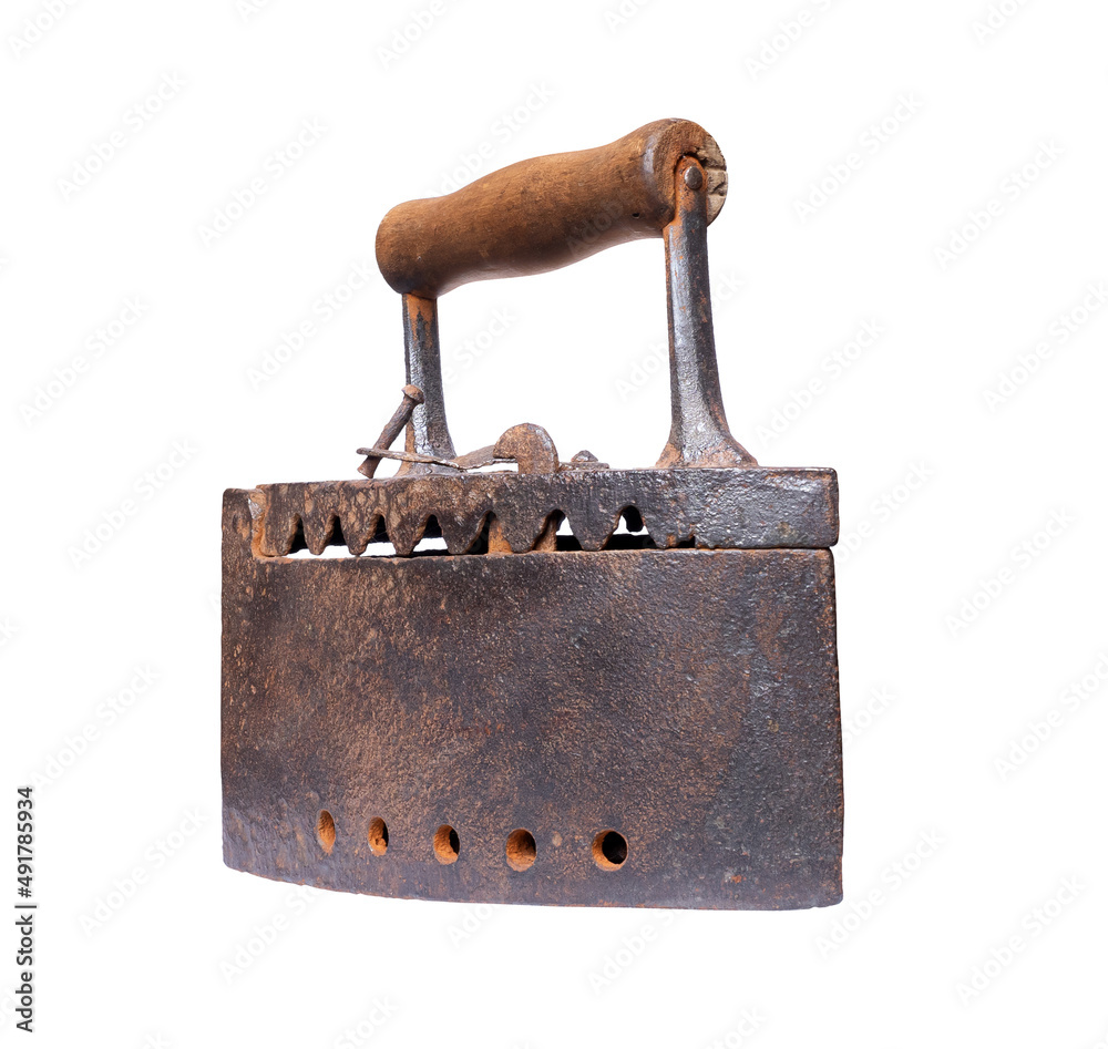 The old rusty coal iron close up isolated on a white background