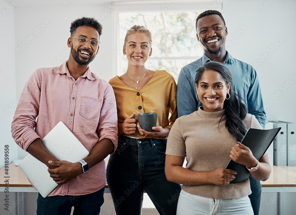 We have some great plans for this business. Cropped portrait of a diverse group businesspeople stand