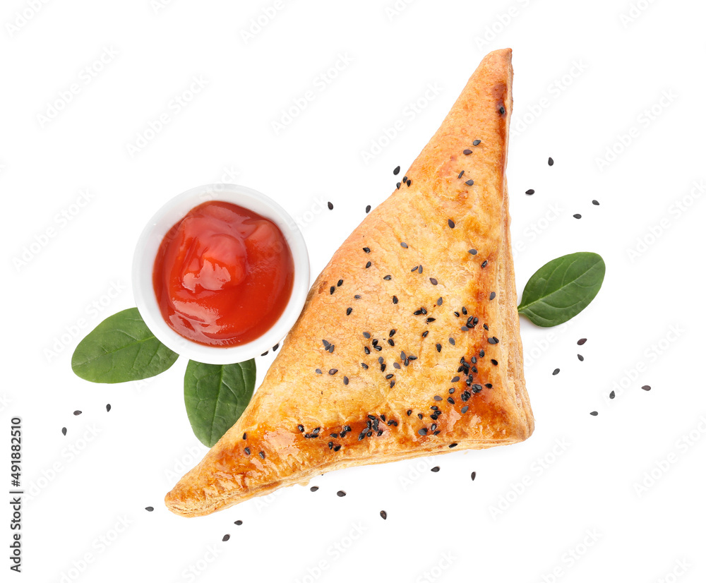 Tasty Uzbek samsa with tomato sauce on white background