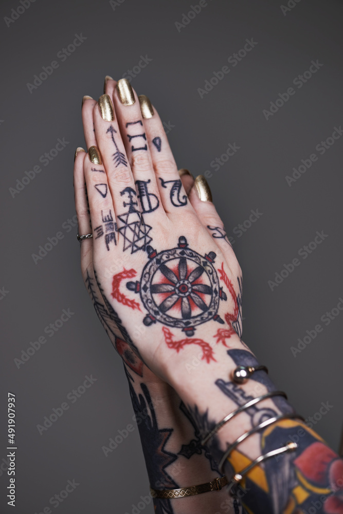 Creative self-expression. A cropped shot of tattooed hands.