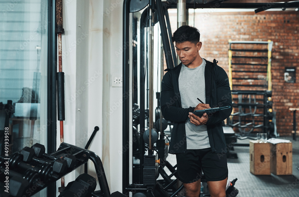 I think were going to need one more of these.... Cropped shot of a handsome young male fitness instr