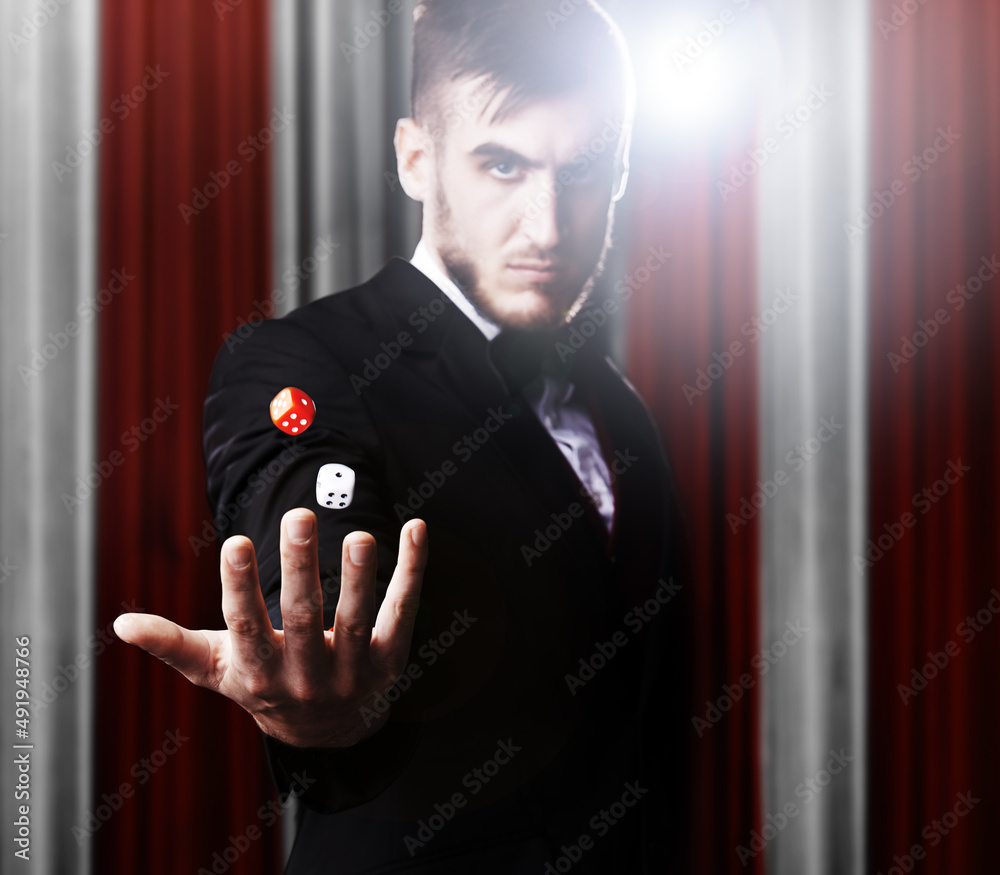 Slight of hand. Shot of a magician at a carnival performance.