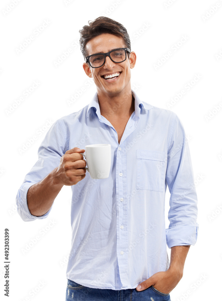 Starting his day with a cup of coffee. Portrait of a young man wearing spectacles and smiling while 