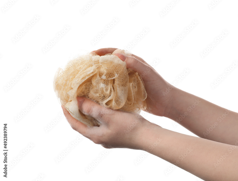 Woman holding bath sponge with foam against white background, closeup