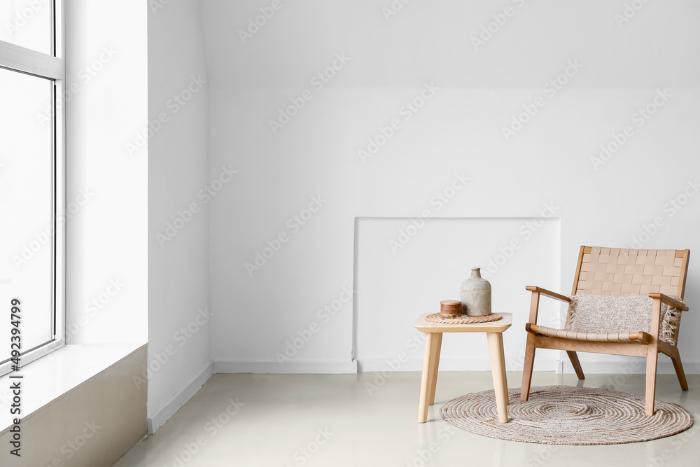 Modern table and chair in interior of light room