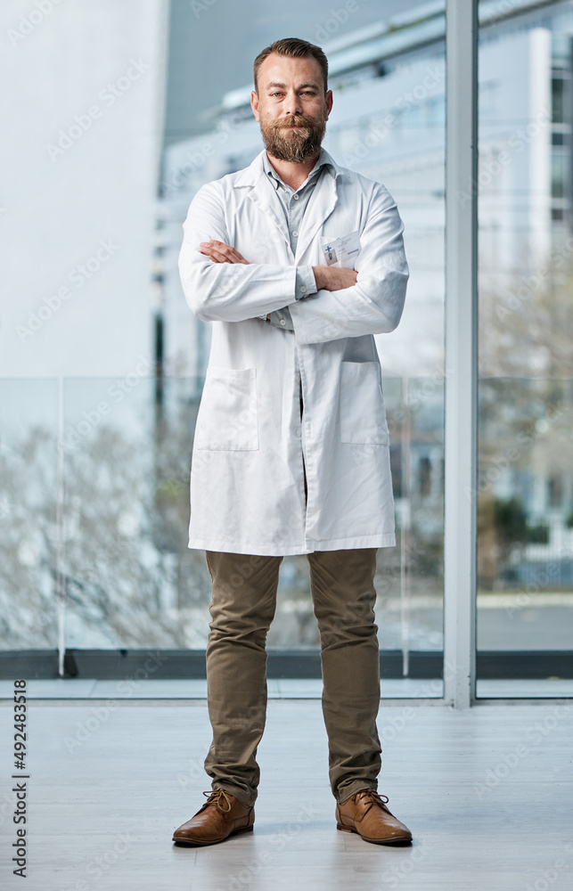 Doctors form a strong pillar in the healthcare system. Portrait of a medical practitioner standing i