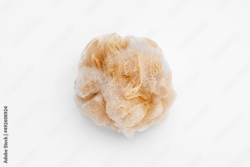 Bath soapy sponge with foam isolated on white background