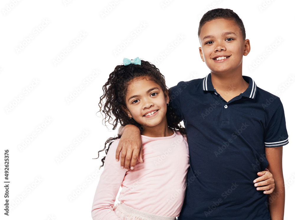 Brother and sister, aka, best friends. Studio portrait of a happy boy and girl embracing one another