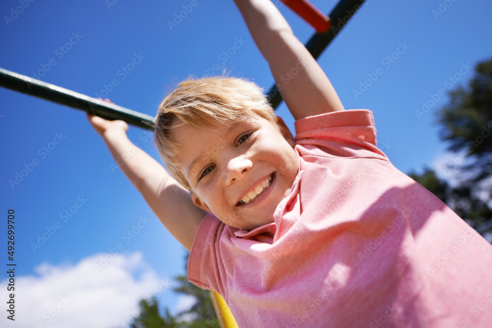 Playtime. A little boy playing in the park.