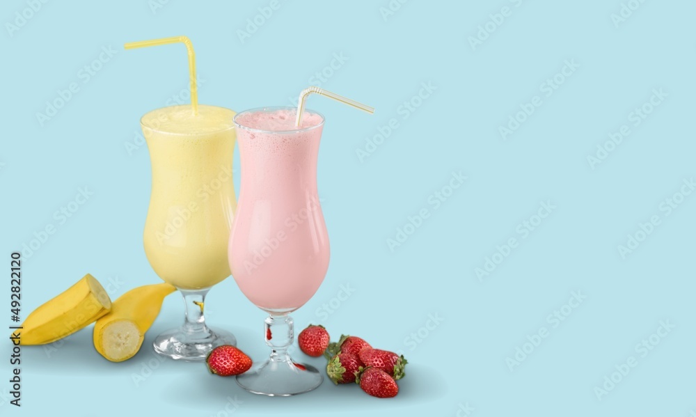 Protein rich smoothies with yogurt and frozen strawberries in glass. Bright berry