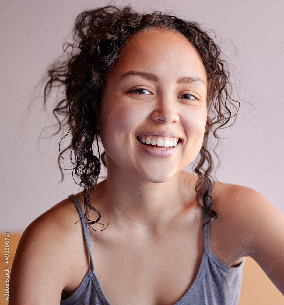 Yes Im a morning person. Portrait of a beautiful young woman sitting at home.