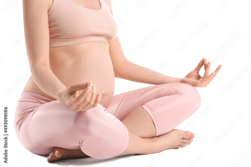 Young pregnant woman meditating on white background, closeup