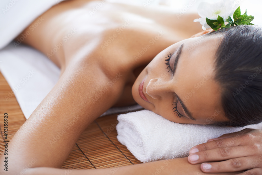 Total stress relief. A young woman lying in a health spa.