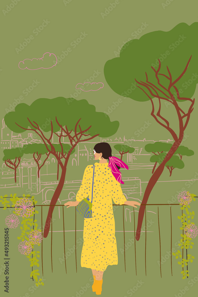 Elegant woman in yellow dress enjoying beautiful view on the old city and high trees while traveling