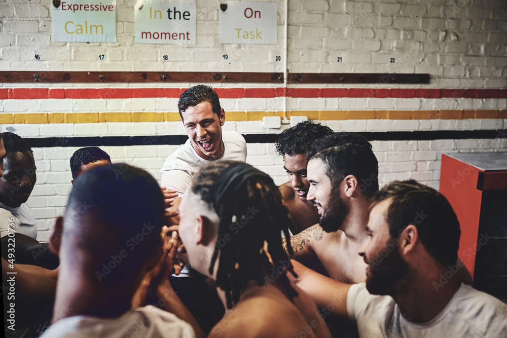 Winning is our nature, no doubt about that. Cropped shot of a group of handsome young rugby players 