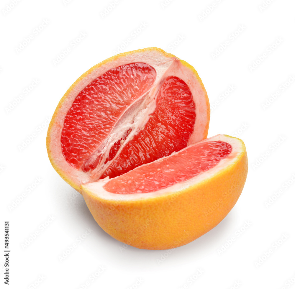 Tasty cut grapefruit on white background