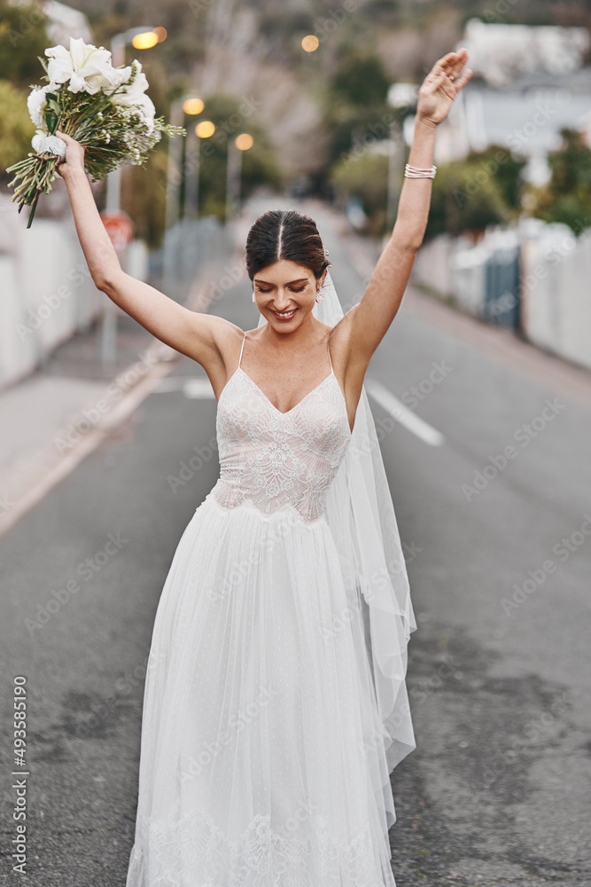 I married the man of my dreams. Cropped shot of a beautiful bride standing outside.