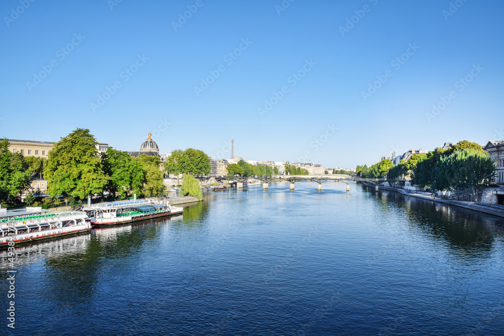 Beautiful panoramic view from the Seine River to the bridge and the city landscape on a sunny summer