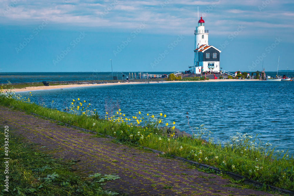 Small old wooden lighthouse on the waterfront, Marken, Netherlands, Europe