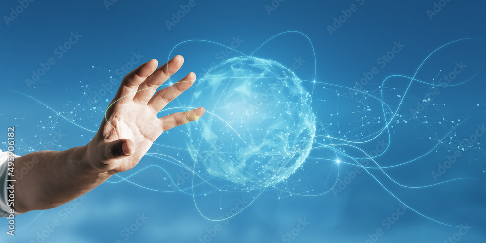 Close up of businessman hand holding abstract metaverse sphere on blurry blue background. Future and