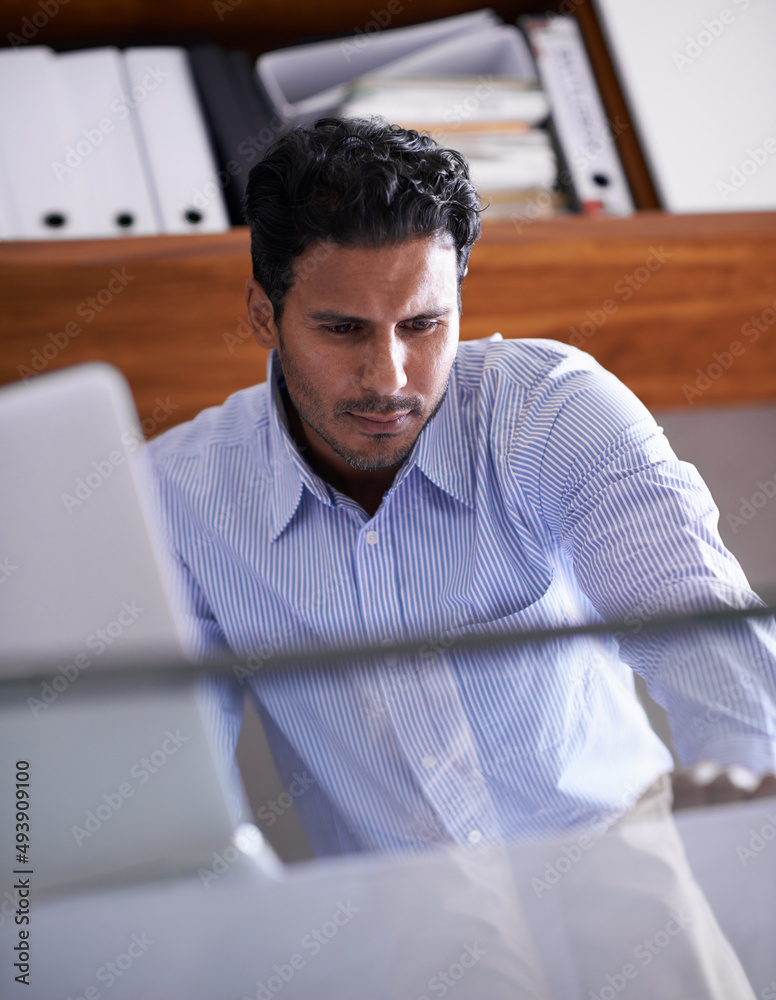 Hes ready for whatever the business world throws at him. Cropped shot of a handsome young businessma