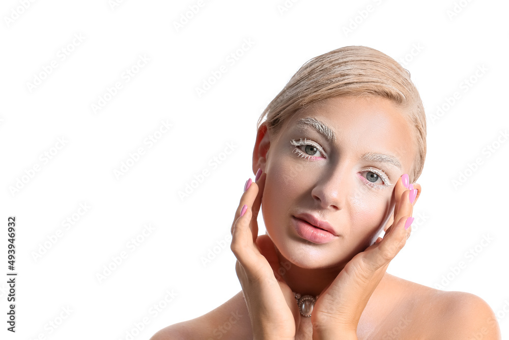 Beautiful young woman with creative makeup on white background