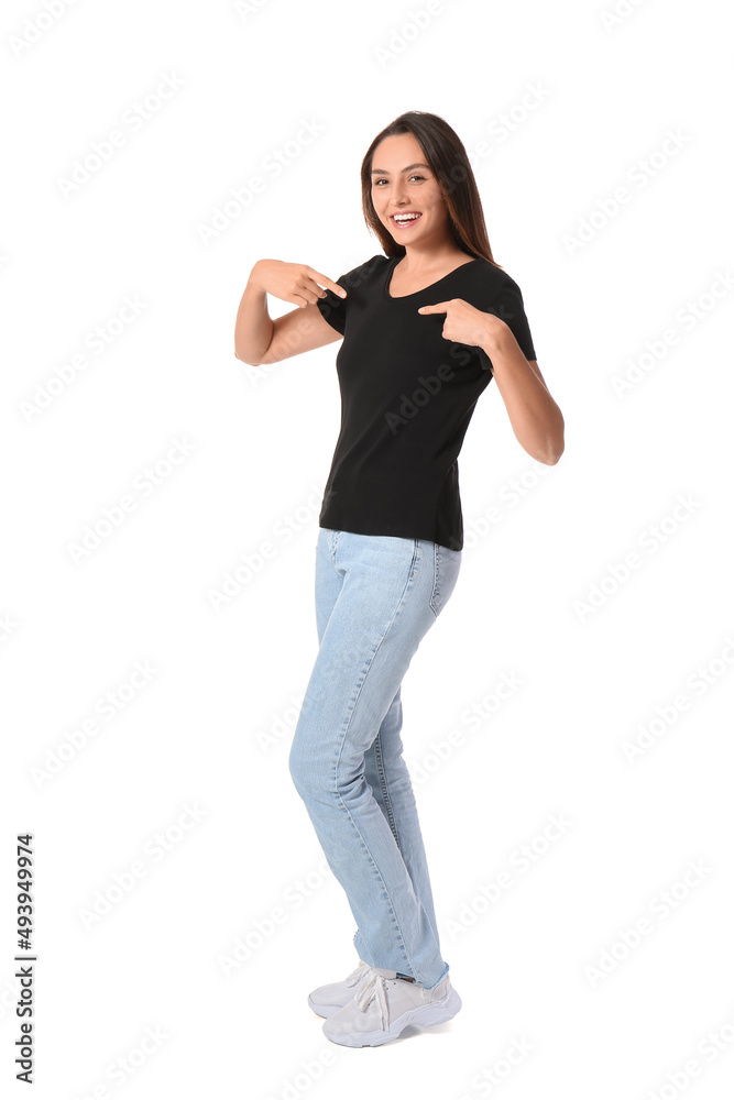 Young woman in blank t-shirt on white background