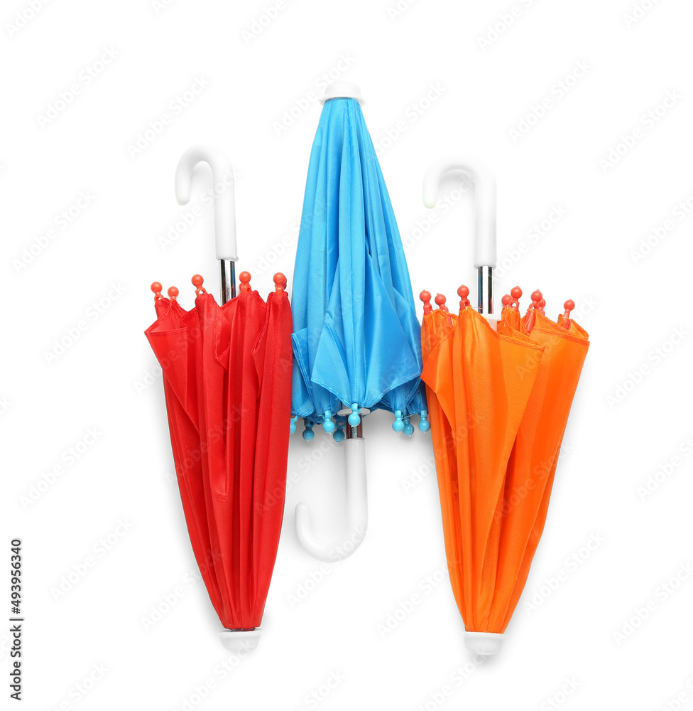 Different umbrellas isolated on white background