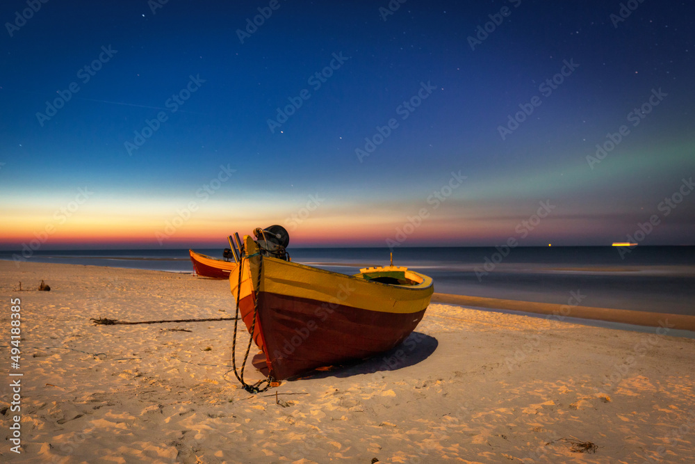 The northern lights over the Baltic Sea in Debki, Poland