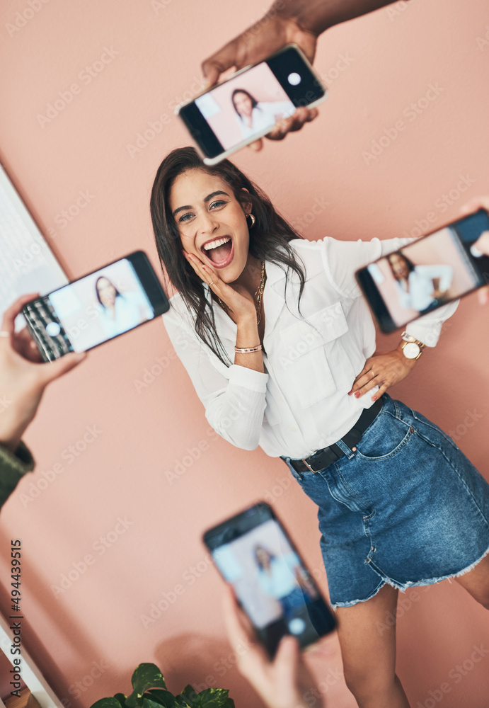 Its important to find the perfect selfie. Shot of a beautiful young woman having her picture taken o