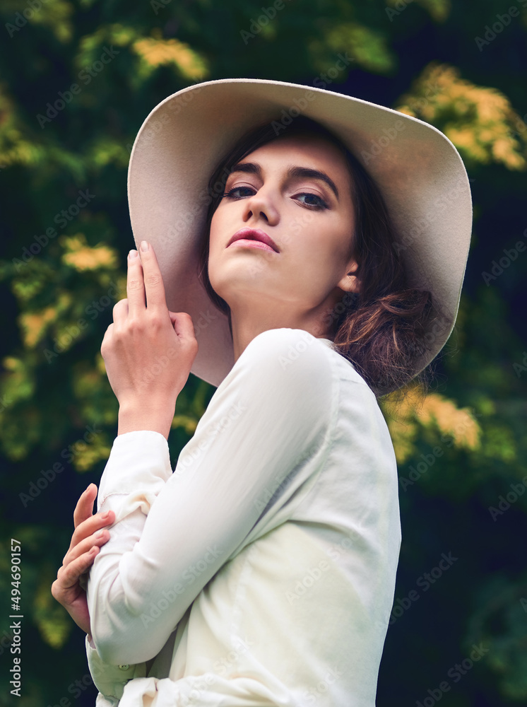 Have you ever seen beauty more enchanting. Portrait of an attractive young woman wearing a stylish h