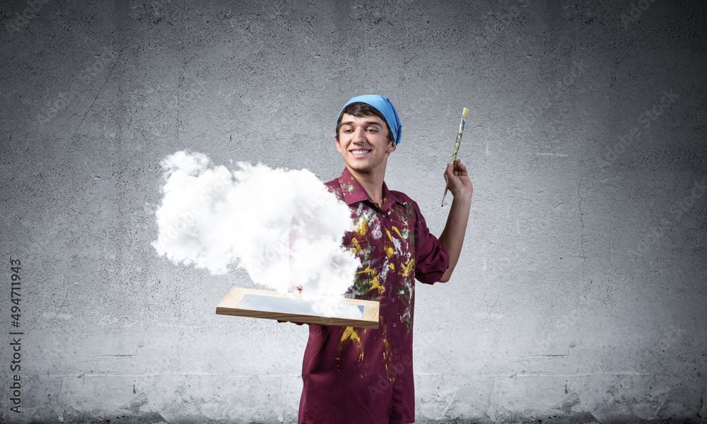 Young artist drawing realistic white cloud