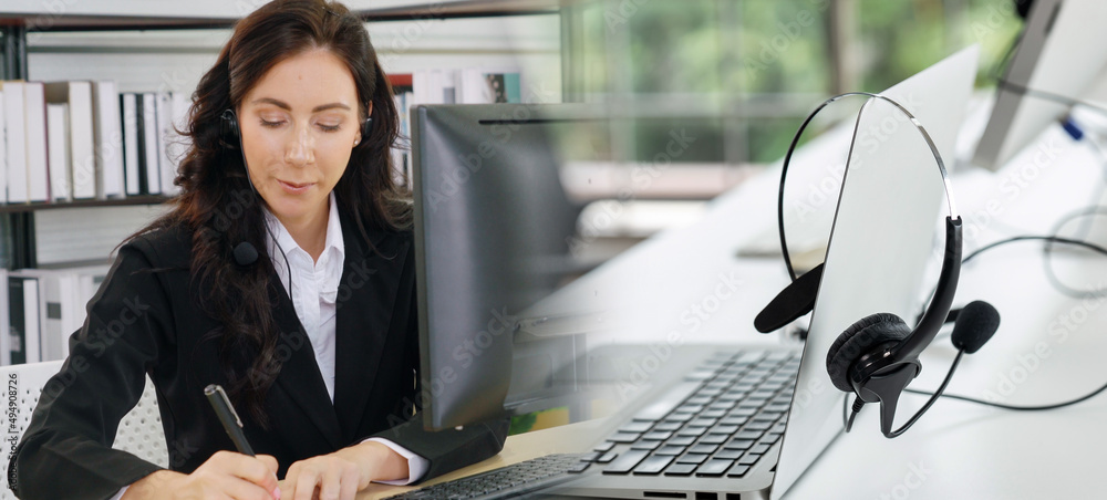 Business people wearing headset working in office to support remote customer or colleague. Call cent