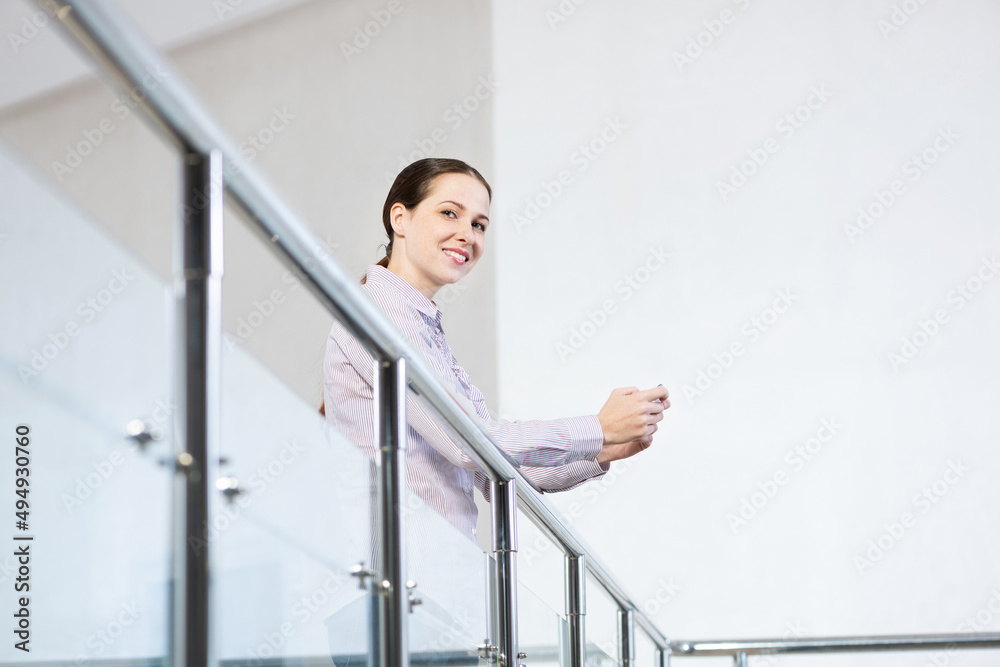 young attractive woman with phone in her hands