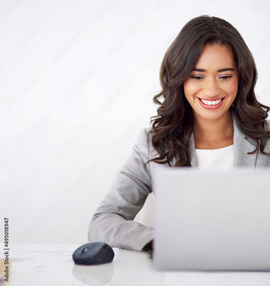 Focused on success. Cropped shot of a young businesswoman working on her laptop.