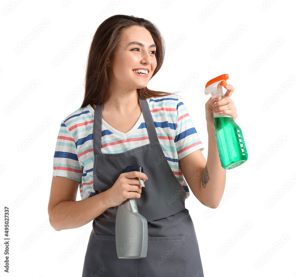 Young woman with detergents isolated on white