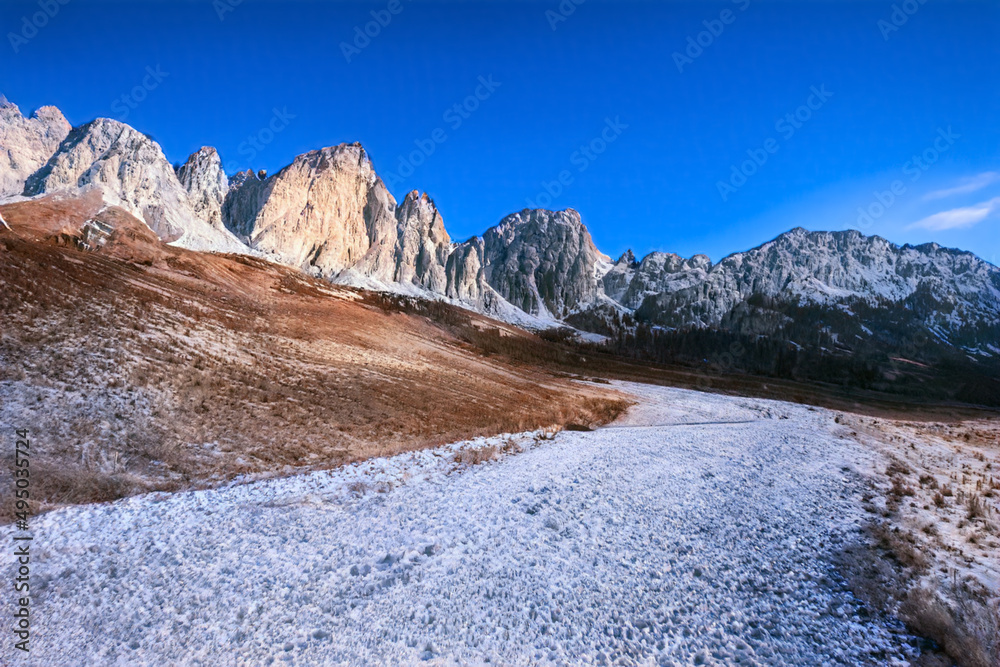 Beautiful winter scenery landscape and snow frosted mountain background in dolomites mountain during