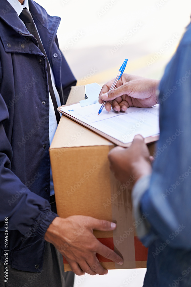 Delivering direct to your door. A friendly delivery man delivering a package to a home.