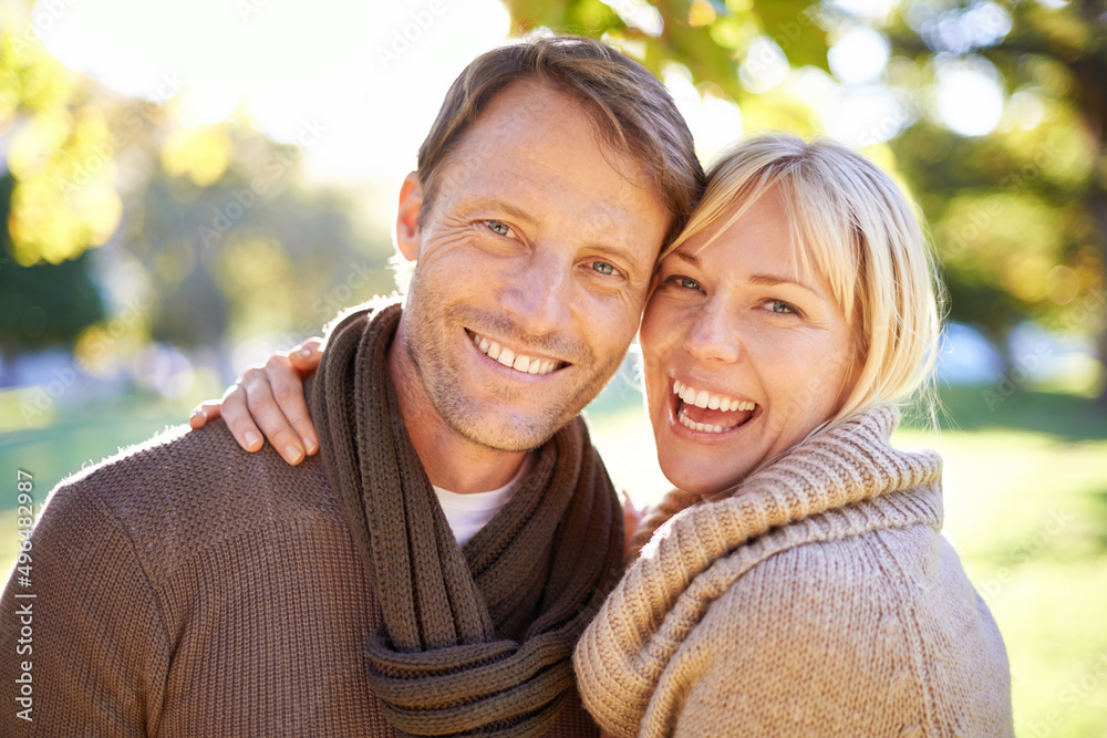 He can always make me smile. Portrait of an attractive young couple at the park.