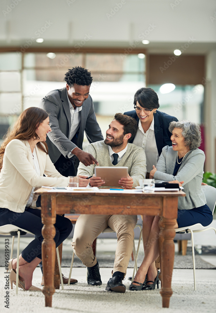 Thats awesome. Cropped shot of a group of businesspeople meeting in the boardroom.