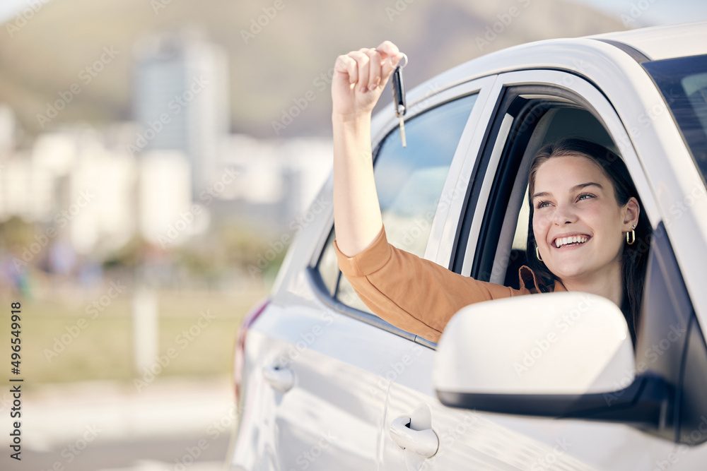 My perfume Ive just been sitting in my new car. Shot of a woman holding the keys to her new car outs