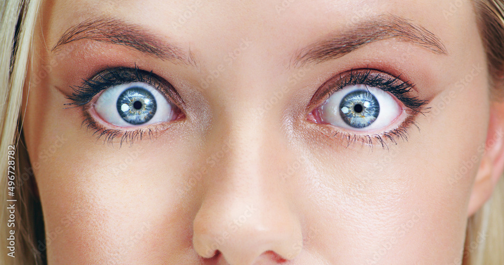 Its shocking isnt it. Closeup beauty shot of a young womans eye.